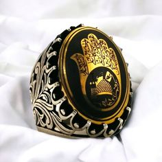 This very beautiful Ring is made of hematite stone with a beautiful engraving of Quranic verses and prayers on it.  size of the gem is 18 x 25 mm The verse written on it: السلام علیک یا اباعبدالله الحسین Traditional Engraved Ring With Engraving Option, Spiritual Black Engraved Sterling Silver Ring, Traditional Carved Rings As Gift, Symbolic Black Engraved Ring As Gift, Traditional Carved Rings For Gift, Ceremonial Black Engraved Jewelry, Symbolic Black Engraved Ring For Gift, Symbolic Carved Engraved Ring As Gift, Symbolic Engraved Carved Ring As Gift