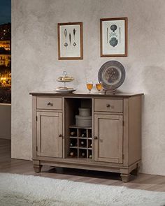 a sideboard with two wine glasses on it