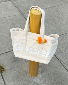 Glossier Brooklyn Glossier Brooklyn Utility Back Limited edition Canvas Natural Canvas Canvas bag Tote Glossier You Look Good, Glossier Sweatshirt, Body Hero, Marketing Activations, Branded Tote Bags, Makeup And Skincare Products, Green Blanket, Merchandise Bags, Balm Dotcom