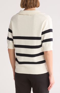 Blocky stripes lend timeless charm to this polo-inspired sweater that's knit from soft cotton yarn. 22" length Spread collar V-neck Short sleeves 100% cotton Machine wash, dry flat Imported Striped Tops With Ribbed Collar For Work, Striped Top With Ribbed Collar For Work, Casual Striped Cotton Polo Sweater, Classic Striped Polo Sweater With Ribbed Collar, Striped Knit Sweater For Work, Casual Cotton Polo Sweater With Contrast Stripes, Striped Knit Top With Ribbed Collar, Fall Cotton Polo Sweater With Striped Collar, Classic Winter Tops With Contrast Stripes