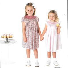 Classic smocked bishop pattern for girls. #smocking #sewingforgirls Playful Smocked Short Sleeve Dress, Pink Smocked Bodice Dress For Playdate, Playful Smock Dress For Playdate, Cute Smocked Dress For Playtime, Cute Smocked Dresses For Playdates, Cute Smock Dress For Playdate, Cute Smocked Bodice Dress For Playtime, Cute Smocked Dress With Smocked Bodice For Playtime, Cute Smocked Dress For Playtime With Smocked Cuffs