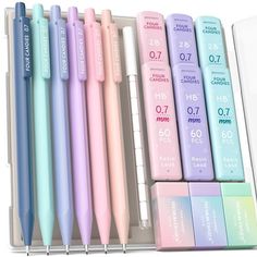 there are many different colored pens in the box