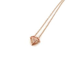 "Diamond shape Cubic Zirconia necklace. Minimalist necklace. Rose Gold plated CZ necklace. Chain Necklace.Diamond Layered necklace You can wear this necklace alone or stack it with othersSo cute and simple! This delicate and dainty necklace is made with: ♥ Rose Gold plated Diamond shape Cubic Zirconia, measures approx 0.8cm ♥ Delicate rose gold plated chain. The length of the necklace is 16\" Please avoid any contact with water or other liquids when you are wearing it! Visit my shop for more lit Gift Diamond-shaped Necklace With Single Diamond, Diamond Necklace With Diamond Markers For Gifts, Diamond Necklaces With Diamond Markers For Gifts, Diamond Outline, Diamond Star Necklace, Monogram Bracelet, Zirconia Necklace, Necklace Rose Gold, Letter Bracelet