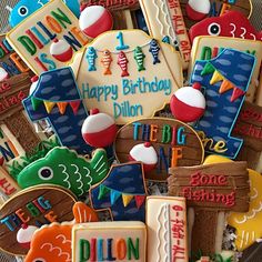 decorated cookies are arranged in the shape of letters and numbers, including one that says happy birthday dillion