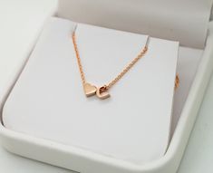 This solid gold letter J initial necklace. Letters are small, please swipe for the pictures for size reference. Could be made in 14K yellow, white and rose gold. If you are looking for a charm necklace, here: https://www.etsy.com/listing/534422198/14k-gold-letter-necklace-tiny-initial Charm bracelet: https://www.etsy.com/listing/465584610/add-on-initial-bracelet-14k-gold-letter All letters, a heart and a star are available, just write down which ones you need in the comment section of the order. Minimalist Rose Gold Necklace For Anniversary, Minimalist Rose Gold Charm Necklace For Anniversary, J Initial Necklace, Letter J Necklace, J Initial, Initial J, Mothers Day Necklace, 14k Gold Initial Necklace, J Necklace