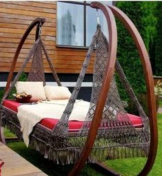 a bed that is sitting in the grass