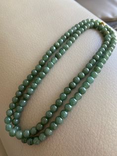 🌈 Jadeite Beaded (6.8mm) Necklace Bracelet, Green, 108 beads 🌷 Untreated Natural Jadeite/ Grade A Jade 🌷 Jade from Myanmar/ Burma 🌷 100% handmade carving 🌷 Bead size : 6.8mm 🌷 Number of Beads : ~108 🌷 Color : Green 🌷 Free shipping from Hong Kong with tracking number provided 🌷 Take approximately 7-28 days to arrive worldwide ❤️ In Chinese Culture: Young people wear jade pendant will have a prosperous life, attracts good luck and friendship Old people wear jade pendant will have a health Classic Green Jewelry With 8mm Beads, Single Strand Jade Beaded Necklace With Round Beads, Green Oval Beaded Jewelry 8mm, Classic Green Beaded Necklaces With Round Beads, Hand-strung Jade Beaded Necklaces With Round Beads, Jade Beaded Necklaces With 8mm Round Beads, Jade Beaded Necklaces With 8mm Beads, Natural Stone Jade Beads, Hand-strung Jade Beaded Necklaces