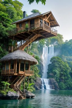 a house with a waterfall in the background