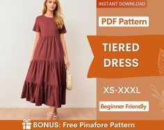 a woman in a red dress with the text, free pattern tiered dress xs - xxl beginner friendly