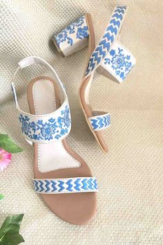 Textured Cream vegan leather with 3 inch Block Heel, With Aztec and Flower embroidery in Blue . Product Features : Color: Cream Material: Soft Faux Leather Wash Care: Spot cleaning only. If the shoe gets wet remember to first dry in the sun before putting it back in the closet. Blue Block Heels, Embroidered Heels, Dr Shoes, Make Up Videos, Ankle Strap Block Heel, Heels Online, Womens Summer Shoes, Blue Block, Leather Block Heels