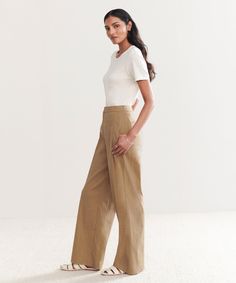 Linen Keaton Pant KhakiWith an elongated fit, the Linen Keaton Pant is an elevated and understated take on classic suiting. Perfectly paired with the Linen Keaton Blazer and a simple cami or tee.58% linen, 21% cotton, 18% nylon, 3% spandex. Made in China. Flat front trouser with 31” inseam. | Jenni Kayne Women's Linen Keaton Pant Size 2 Jenni Kayne, Linen Women, Color Khaki, Made In China, Dream Wardrobe, Get Dressed, Casual Pants, Size 12, Size 2