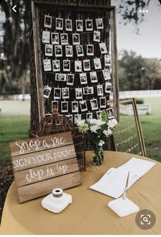 a wooden sign sitting on top of a table