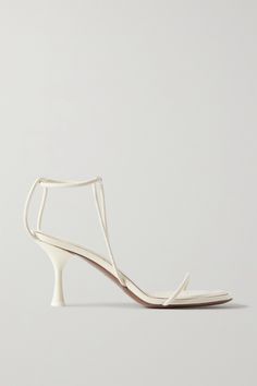 NEOUS' sandals may look minimal, but the effort behind the making of them is anything but. Crafted from cream leather, they have soft, slender straps and slim heels. Bride Heels, Bottega Veneta Jodie, Easy Outfits, Woven Leather Bag, Black Wide Leg Trousers, White Sandals Heels, Sandals White, Black Sandals Heels, White Sandals