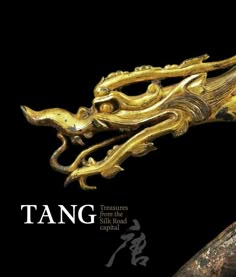 the cover of tang magazine with an image of a golden dragon