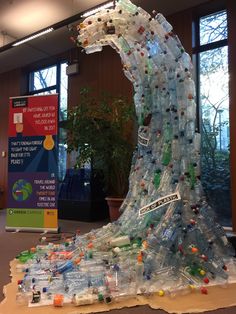 a large sculpture made out of plastic bottles