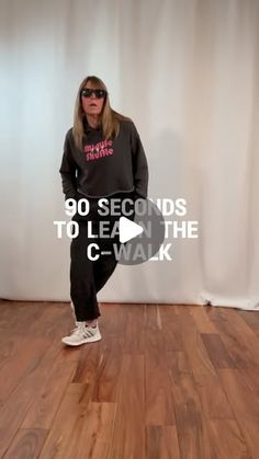 a woman standing on top of a wooden floor in front of a white wall with the words 90 seconds to learn the c - walk