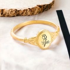 Our Customized birth flower ring makes the perfect trendy gift for your mother, sister, grandparent, bridesmaid, close friend, Each personalized premium quality ring can be personalized with 1-5 birthflowers. We offer 12 different kinds of birth flowers. Material :- 925 STERLING SILVER , ROSE GOLD , YELLOW GOLD Stone : Only Metal Pls check your ring size before purchasing. Thank you so much! Flowers Number: each ring can fit: 1-4 birth flowers January ★ Snowdrop ★ - Admiration, love, hope, rebirth February ★ Violet ★ - Faithfulness, humility, spiritual wisdom and young love March ★ Daffodil ★ - New beginnings, prosperity April ★ Daisy ★ - Purity, innocence, blissful pleasure May ★ Hawthorn ★ - Happiness, hope, and faith June ★ Rose ★ - Romance, happiness July ★ Water Lily ★ - Pleasure, pea Heirloom Birth Flower Jewelry, Classic Round Birth Flower Jewelry, Heirloom Birth Flower Jewelry For Anniversary, Elegant Birth Flower Ring For Gift, Elegant Birth Flower Ring As Gift, Elegant Birth Flower Ring Gift, Oval Flower Ring Stamped 14k For Gift, Classic Wedding Jewelry With Birth Flower, Vintage Birth Flower Rings For Gift