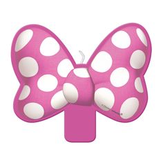 a pink and white bow with polka dots on it's head is attached to a clip