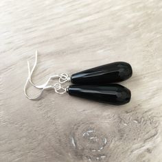 BLACK ONYX EARRINGS - Long Black Earrings - Black Gemstone Earrings Black Faceted Earrings - Faceted Onyx Earrings - Elegant Black Earrings These handcrafted black onyx earrings are simply gorgeous! Silver fish hooks featuring a beautiful 25mm x 8mm faceted black onyx gemstone and measuring 1.75 inches in length. Adds an elegant touch to any outfit! Item is carefully packaged and shipped via USPS in a sturdy protective mailer. Check out more fabulous jewelry and enter my shop here: https://www.e Black Onyx Earrings, Fish Hooks, Silver Fish, Onyx Earrings, Earrings Elegant, Onyx Gemstone, Fabulous Jewelry, Earrings Black, Black Earrings