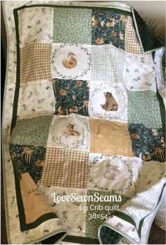 a quilted blanket with animals on it and the words love sewnseams