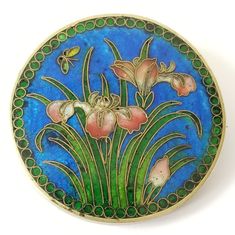 Absolutely Stunning Old Brooch Japanese Gin Bari Foil Cloisonne Enamel The Enamel Looks Dark In Low Light, But Shines Intensely Brilliant Blue In The Sunlight- It Reminds Me Of The Feathers Of The Kingfisher Bird. Pink Iris Flowers With Green Leaves And Butterfly Design. It Looks Like The Pin Stem And Hinge May Have Been Replaced At Some Point? Gold Tone Metal Green On The Back. I Believe This May Be From The Meiji Period (1868-1912) , Though Exact Age Is Unknown. It's In Good Preowned Condtion With Some Surface Wear To The Enamel And Lots Of Patina To The Metal, But Nothing Major. This Piece Is A Beautiful Little Work Of Art! Measures Approx 1.75" Across. Ships Fast:) Harj81688ne8j2l Cloisonne Art, Pink Iris, Cloisonne Enamel Jewelry, Kingfisher Bird, Meiji Period, Cloisonne Enamel, Iris Flowers, Enamel Brooch, Embroidery Ideas