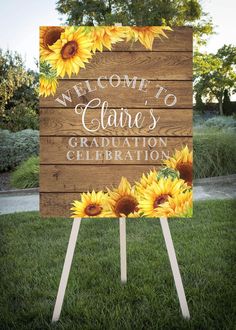 a wooden sign with sunflowers on it that says welcome to emmett's bridal shower