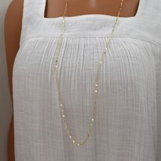 Long Gold Chain Necklace, 14Kt Gold Filled - 36 inch Fancy Gold Opera Length Chain - Vintage Inspired Long Rope Necklace A shimmering, glamorous sparkle characterizes this dramatic necklace. Fine geometric links create mesmerizing reflections for a look that is both trendy and classic. Finished with a lightweight spring ring clasp. This piece is so versatile: wear it over your favorite crew neck tee, pair with other necklaces for a layered look, or add just the right amount of sparkle to formal attire. It can also be wrapped around twice to create a shorter, two strand look.  All materials are 14Kt gold-filled. What is Gold Filled? Gold filled jewelry has a layer of solid gold that is 100 times thicker than that of gold plated jewelry. It is hypoallergenic, resistant to tarnish, and will n Dramatic Necklace, Cable Jewelry, Long Rope, 1920s Vintage, Gold Long Necklace, Versatile Jewelry, Art Deco Necklace, Shades Of Gold, Wedding Jewellery Necklace