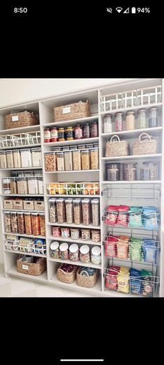 an organized pantry with lots of food in it