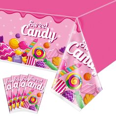 a pink box with candy and candies on it