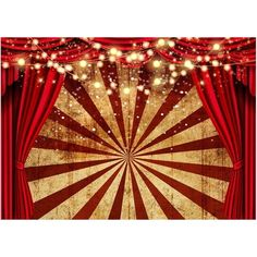 an image of a circus stage with red curtains and lights