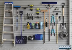 a garage with tools hanging on the wall