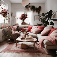 a living room filled with lots of furniture and flowers