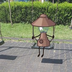 a cartoon character is sitting on a swing