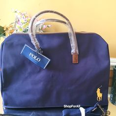 Brand New Polo Ralph Lauren Duffel Bag Weekender, Travel Bag, Gym Bag! -Approximate Dimensions: 20" X 12" X 8" With 8" Strap Drop -Blue Color Body, Black Handles And Trim. The Lining Made Of 90% Polyester And 10% Polyurethane -Removable Shoulder Strap 100% Authentic Made Exclusively For The Ralph Lauren Fragrance Collection Bundle To Save Blue Leather Trim Shopping Bag, Blue Bags With Leather Trim For Shopping, Blue Leather Trim Bags For Shopping, Navy Shoulder Bag With Dust Bag For Travel, Blue Travel Bag With Leather Trim, Ralph Lauren Fragrance, Canvas Duffle Bag, Large Luggage, Ralph Lauren Bags