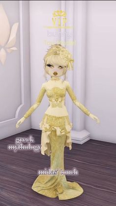 an animated doll wearing a yellow dress in a room with wood flooring and white walls