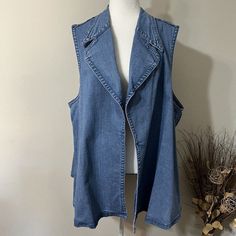 Lane Bryant Swing Vest 26/28 Plus Blue Denim Sleeveless Open Front Pockets New. Please Look At The Pictures Carefully To See More Details... You Receive Exactly What’s On The Pictures. New With Tags Underarm To Underarm 26” Shoulder To Hem 30” Raw Hem Pockets Sleeveless Medium Wash Denim Top For Fall, Medium Wash Denim Vest Top For Fall, Fall Medium Wash Denim Vest Top, Denim Blue Denim Vest Outerwear, Sleeveless Denim Vest Jacket, Sleeveless Denim Blue Outerwear For Spring, Denim Blue Vest Top For Fall, Spring Dark Wash Denim Vest Top, Fall Sleeveless Denim Vest Top