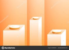 three white pedestals with gold plates on them against an orange background stock photo and royalty