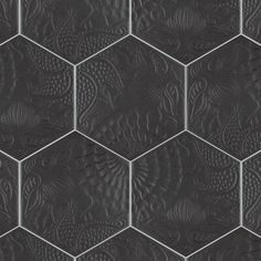 black hexagonal tiles with intricate designs