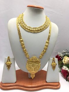 Handmade Indian Jewelry Asian Wedding Bridal Jewellery Party Ethnic Wear 22ct Gold Plated Bridal Necklace Set Rani Haar Bridal Jewellery Set  PLEASE NOTE, This Item Is Not Real Gold .Only Good Quality Gold Plated Jewellery .it is Artificial jewellery. It is a perfect match with formal attire on special occasions or with casual wearing.  Slight Colour variations possible due to difference in screen and photograph Care instructions Keep Jewellery away from direct heat, water, perfumes, deodorants 22k Gold Bridal Necklace For Puja, Gold Jewelry Sets For Puja And Festivals, Traditional Gold Plated Bridal Necklace For Puja, Bollywood Gold Jewelry Sets For Puja, Bollywood Style Gold Jewelry Sets For Puja, Festive Puja Yellow Gold Bridal Necklace, Heavy Gold Bollywood Traditional Wear, 22k Gold Jewelry Sets With Cutdana, Heavy Gold Traditional Wear For Diwali