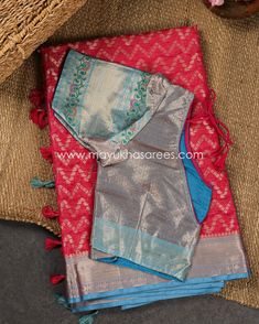 Discover the allure of our Red & Blue Banarasi Kora Silk Saree, featuring a Chevron Pattern Body, Tifli Borders, and a perfectly stitched blouse designed for sizes 38-44. Crafted from exquisite Banarasi Kora Silk, this saree drapes gracefully, offering both comfort and a luxurious sheen, making it an ideal choice for various occasions. The harmonious combination of red and blue exudes vibrancy and sophistication, while the Chevron Pattern Body and Tifli Borders add a touch of timeless beauty to your ensemble. This saree seamlessly blends tradition and contemporary style, ensuring you stand out at any gathering. Mayukha Saree Boutique, based in the USA, is thrilled to offer a special treat: FREE shipping nationwide. Now, you can effortlessly embrace the rich artistry of India with your orde Saree Boutique, Saree Drapes, Blouse Designed, Kora Silk Sarees, Chevron Pattern, Contemporary Fashion, Silk Saree, Timeless Beauty, Blouse Designs