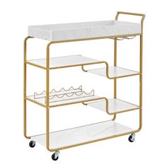 a white and gold cart with two shelves