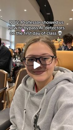 a woman wearing glasses sitting at a table in front of a laptop computer with the caption pov professor showed us how to dypass all detectorors on the first day of class