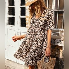 Nwt Leopard Print Smock Dress. Short Sleeve. Flared Dress. Size ~ S/4 Bust ~ 37.8” L ~ 35” Relaxed Fit Smock Dress For Day Out, Casual V-neck Smock Dress, Casual V-neck Smock Midi Dress, Knee-length Smock Midi Dress, Knee-length Smocked Midi Dress, Casual Smock Dress With Relaxed Fit, Smock Midi Dress For Day Out, Fall Smock Dress With Short Sleeves, Short Sleeve Smock Dresses For Day Out