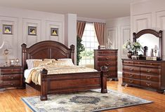 a bedroom scene with focus on the bed and dresser