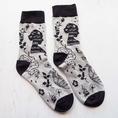 Introducing our Gothic Literature-inspired Socks featuring Literary Emporium's brand pattern. Designed for the ultimate book lover, these socks pay homage to the captivating tales of Frankenstein, Jane Eyre, and the haunting world of Edgar Allan Poe's 'The Raven.' These black and grey socks are adorned with a dark and enchanting pattern that captures the essence of Gothic literature. These enchanting socks are the perfect accessory for any book lover with a penchant for Gothic tales! Made from 7 Gothic Socks, Gothic Literature, Literature Gifts, Cosy Socks, Womens Socks, Grey Socks, Gift For Book Lover, Comfy Socks, Stylish Socks