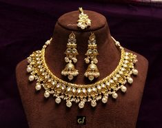 *Light Weight Gold white,Ruby pink Kundan Choker Adjustable necklace set with earrings and tikka. *Studded with kundan stone. *D.no.1-Gold white *Light Weight Gold kundan necklace. *Necklace widht- 1.1 inches (included pearl drop) *Earrings Length- 2.5 inches(included pearl drop) *Breadth- 1.6 inches *D.no.2- gold white *Light Weight gold kundan necklace. *Necklace widht- 1.5 inches (included pearl drop) *Earrings Length- 3.2 inches(included pearl drop) *Earrings Breadth- 1.1 inches Bollywood Style White Bridal Sets With Latkans, White Latkans Necklace For Wedding, White Wedding Necklaces With Latkans, White Temple Jewelry Set For Marriage, White Kundan Jewelry Sets With Hand Set Details, White Chandbali Jewelry Sets Hand Set, White Kundan Necklaces For Marriage, White Kundan Bridal Sets, White Kundan Bridal Sets For Marriage