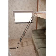 a ladder leaning against the wall near a couch