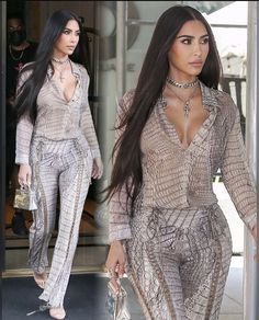 kim kardash in snakeskin jumpsuits leaving her hotel