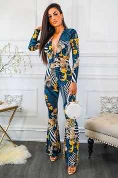 Stunning gorgeous print Deep V neck jumpsuit Deep V neckline Long Sleeves Flared bottom Model is wearing a size small True to size V Neck Jumpsuit, V Neckline, Deep V Neck, Deep V, Jumpsuit, Long Sleeve Dress, Long Sleeves, Fashion Outfits, V Neck