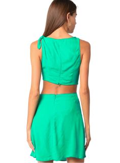 Indulge in style with the Austin Sleeveless Cutout Mini Dress! This dress features a unique cutout design that exposes just the right amount of skin, making it perfect for a night out. The sleeveless style keeps you cool while the mini length shows off your legs. DETAILS Green Color Cut Out Side Invisible Zipper Sleeveless Tie Feature Mini Length 100% Rayon Olivaceous is a women-led company that inspires women to be confident in their clothing. Their clothing aims to be trendy and timeless at an affordable price. Cutout Mini Dress, Cutout Design, Be Confident, Mini Dress Shop, Cut And Color, Invisible Zipper, Green Colors, Green Color, Dress Shop